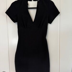BEBE Black Bodycon Mini Dress – XXS